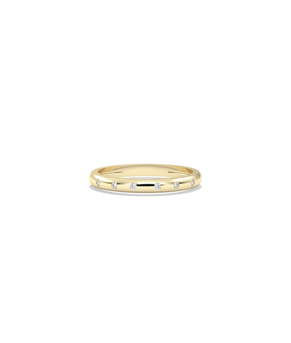 Diamond Bezel Station Band Ring in yellow gold with bezel-set diamond stations