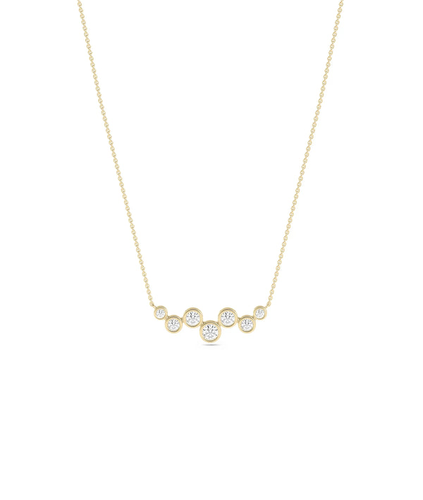 Diamond Bezel Set Cluster Necklace in yellow gold modern grouped