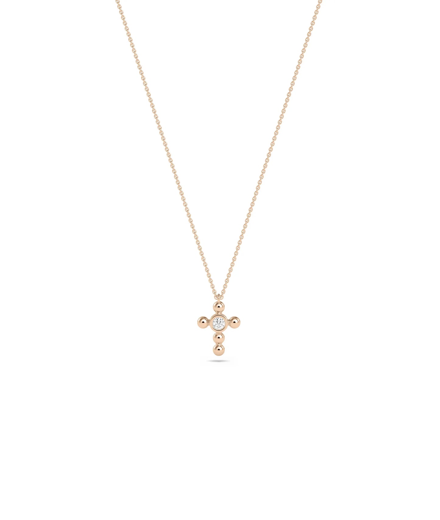 Diamond Solitaire Cross Charm in rose gold warm faithful elegance