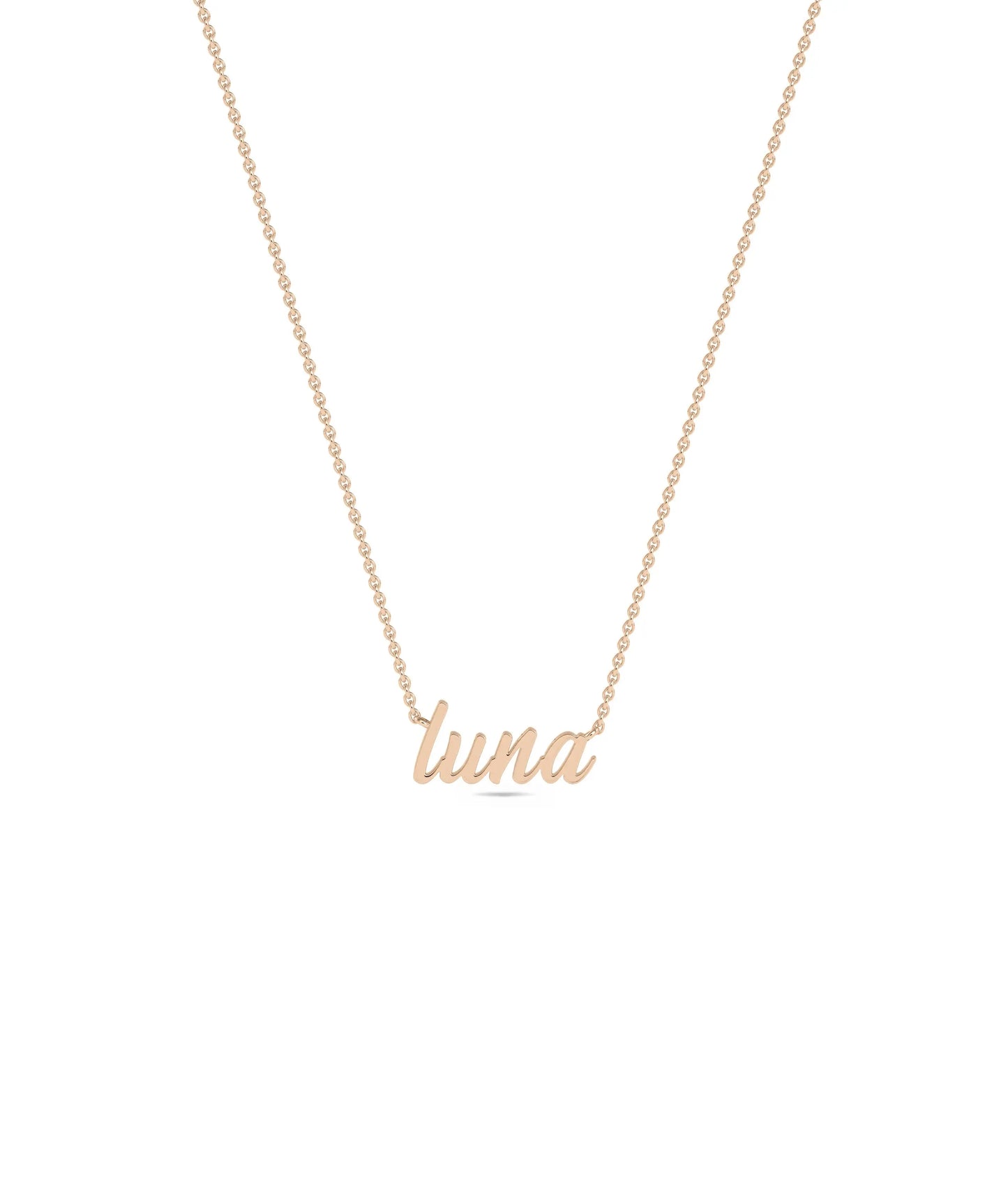 Custom Rose Gold Name Necklace layered with other chains showing versatile styling