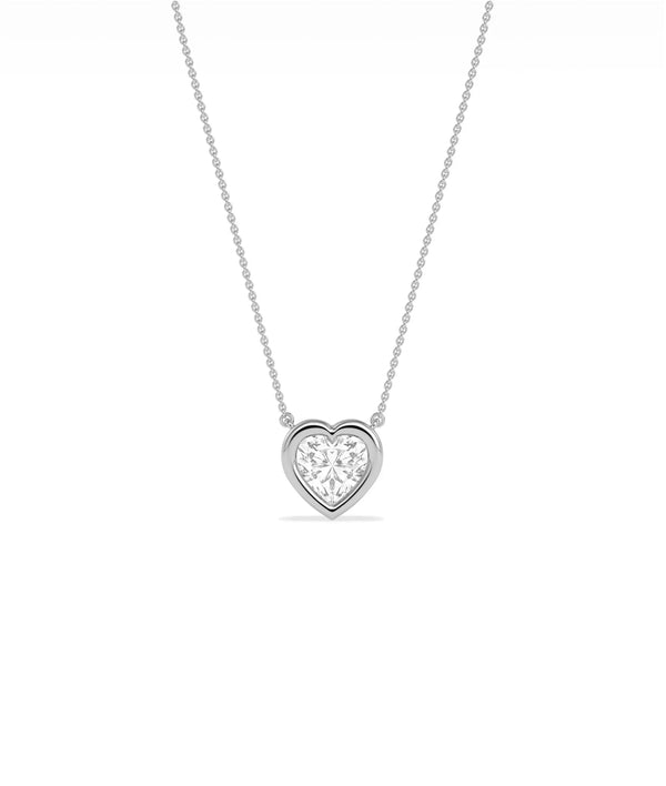 Heart shaped diamond necklace in bubble bezel setting solid gold chain closeup view alternate view
