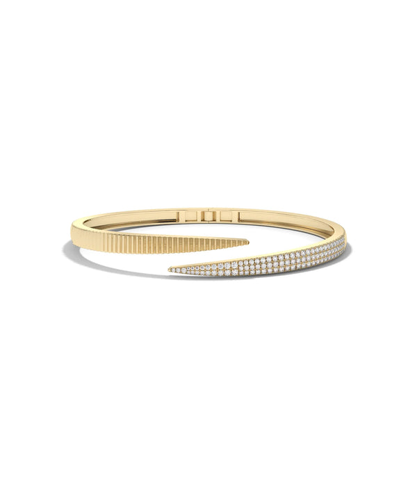 Fluted bypass bangle front view in yellow gold with diamond crossover design