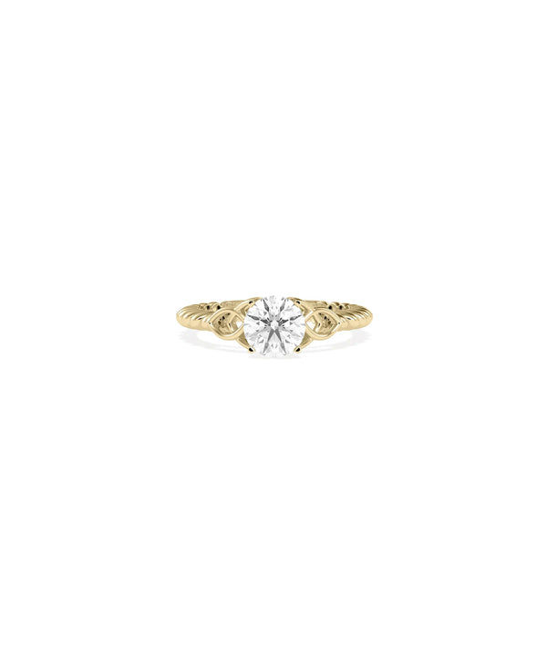 Solitaire Round Filigree Design Ring with diamond and intricate gold detailing