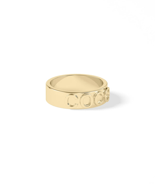 Personalized solid gold band ring close up of name inscription clarity alternate view