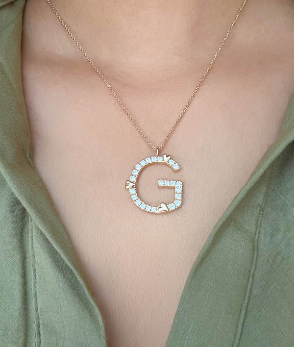 Diamond initial charm with gold hearts pendant in 14K solid gold alternate view