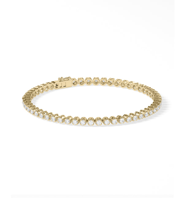 Bezel set diamond tennis bracelet in yellow gold side profile view alternate view
