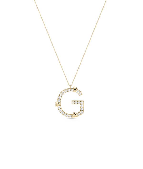 Diamond initial pendant with gold heart charm in 14K yellow gold