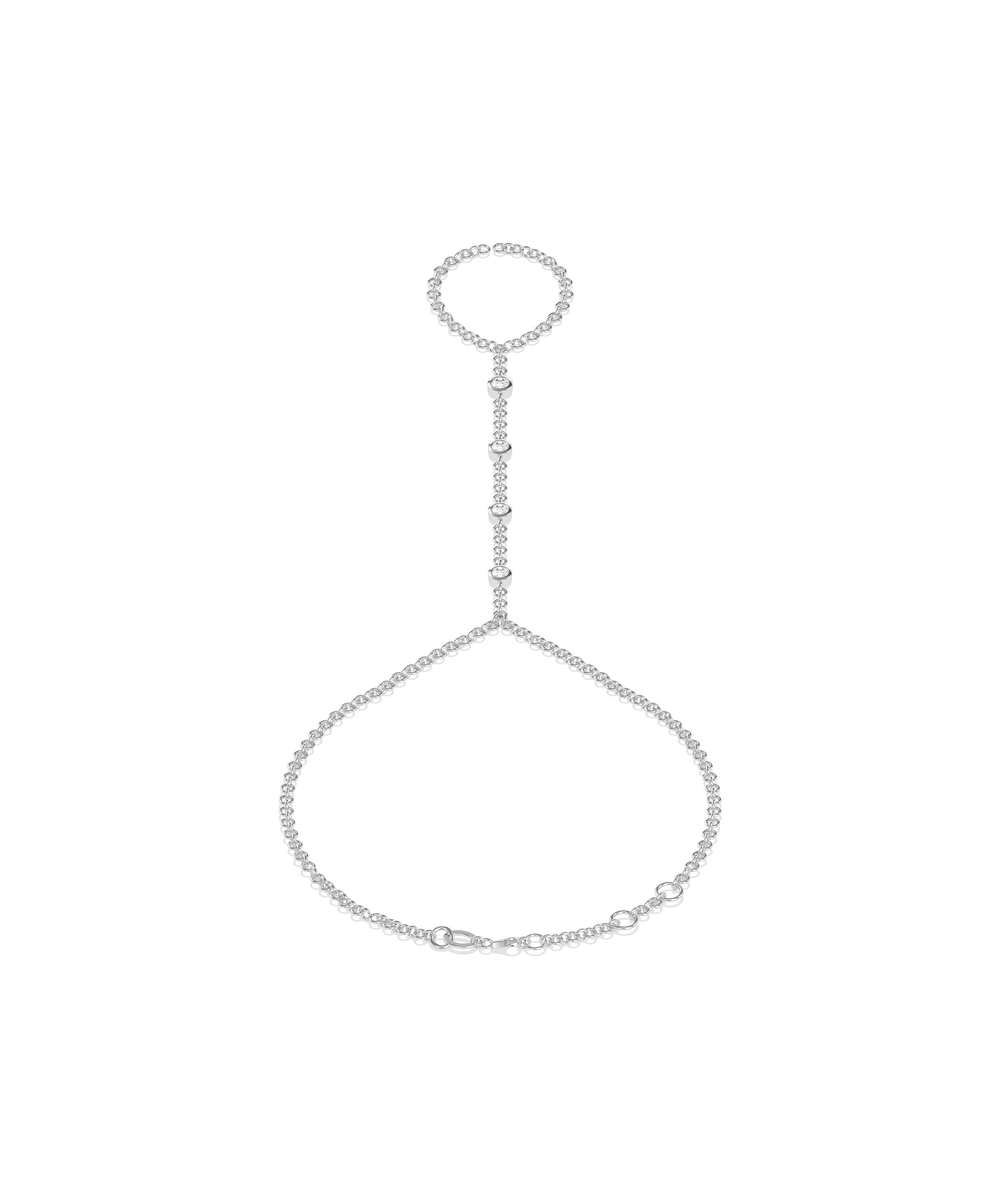 Silver chain hand bracelet with finger ring and bezel-set crystal stations