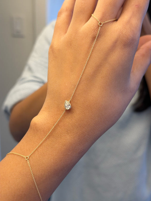 Bezel pear lab diamond hand chain bracelet in 14K gold alternate view