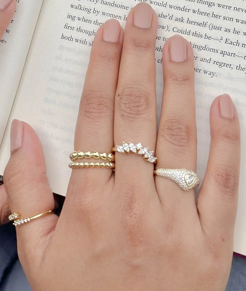 Curved Multi Shape Diamond Band Ring on display highlighting unique elegance