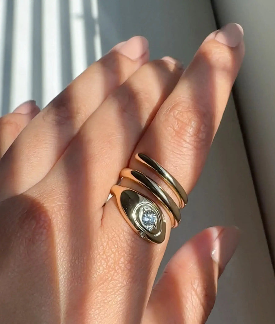 Diamond Snake Swirl Ring worn on hand displaying bold serpent symbolism
