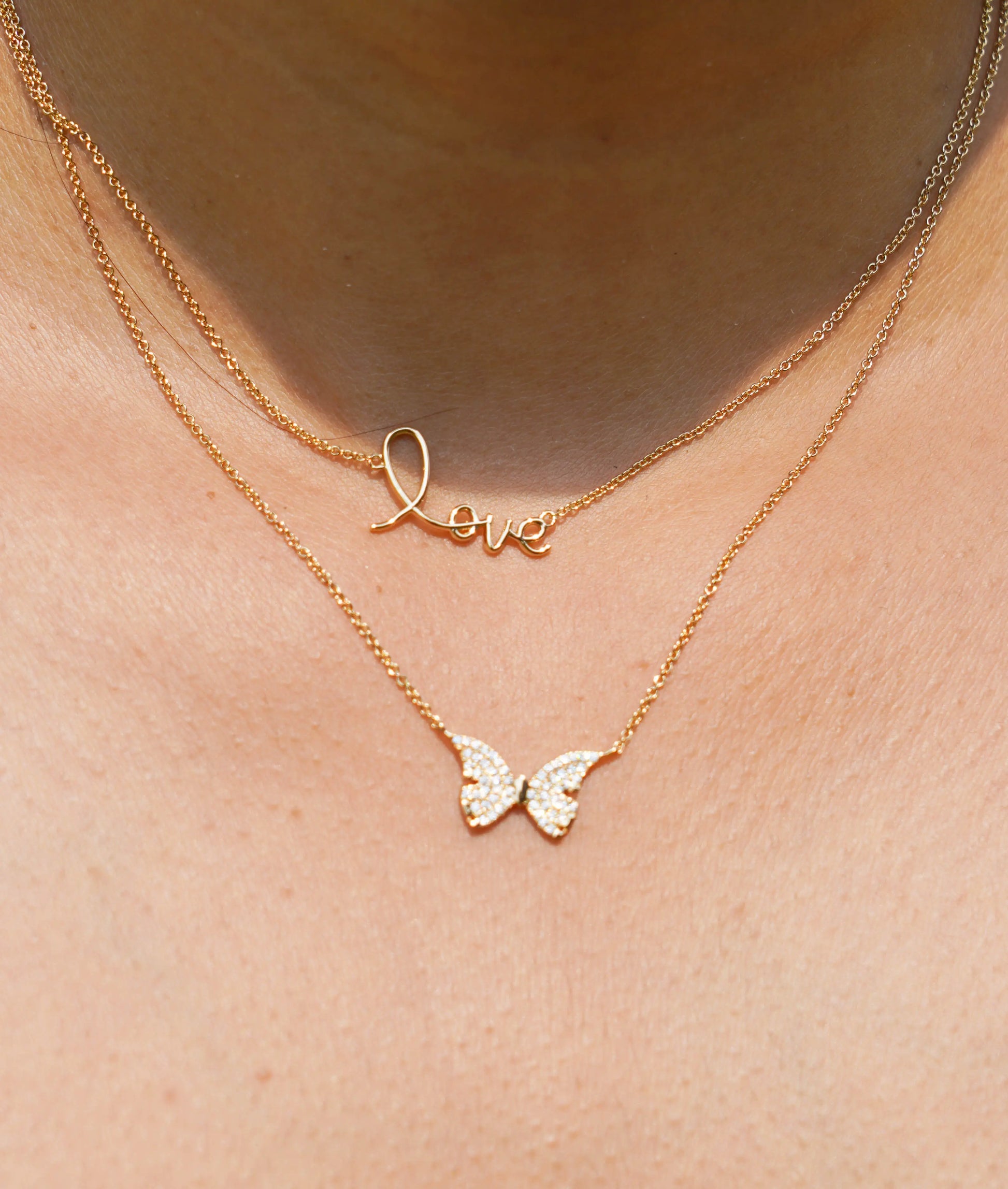 Custom Gold Necklace worn on neckline displaying personalized script elegantly