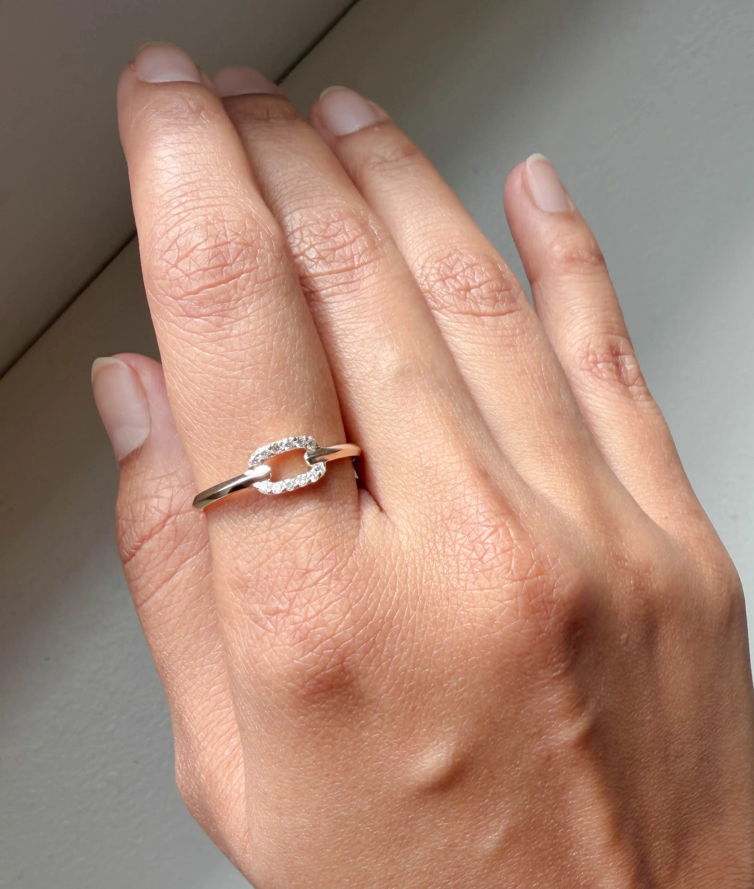 Diamond Link Band Ring on hand displaying modern chain-link band styling