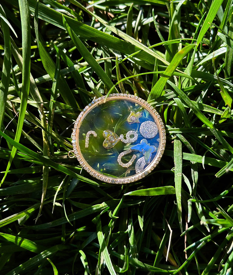 Diamond circle glass locket charm lifestyle shot displaying fine jewelry elegance