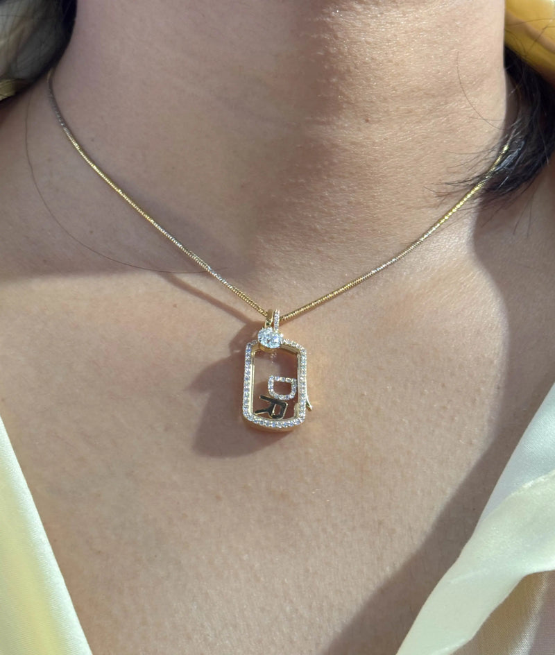 Diamond glass locket charm elegantly displayed on jewelry presentation