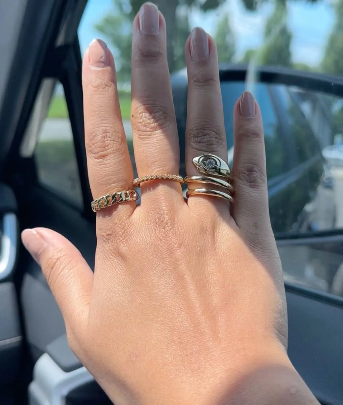 Diamond Bezel Band Ring worn on hand displaying sleek contemporary elegance