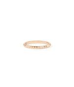 Rose gold pyramid ring featuring unique triangular texture and refined elegance