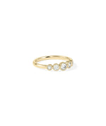 Close-up of graduating diamonds on 5 Stone Graduating Diamond Band Ring with brilliant sparkle