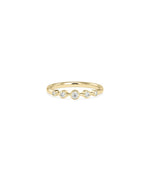5 Stone Bezel Set Graduating Diamond Band Ring showing progressive bezel sizes along band.