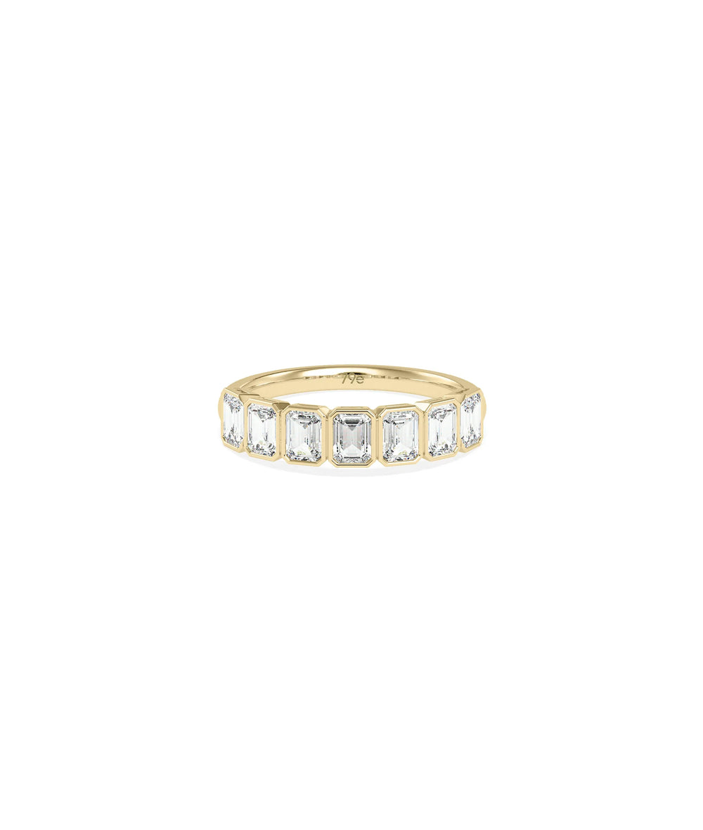 Emerald Cut Half Band Ring in yellow gold with substantial emerald-cut diamonds on top