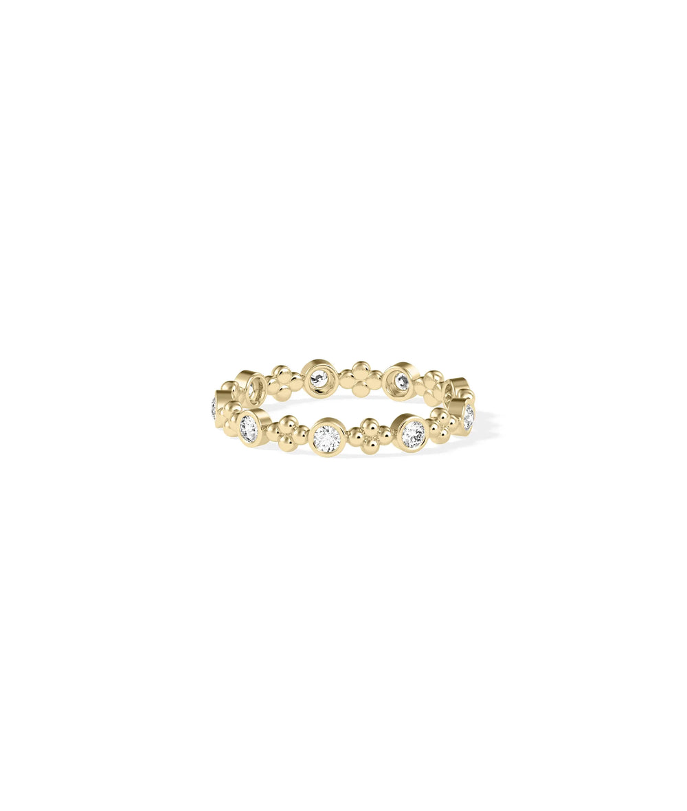 Gold bead station ring side view displaying 3mm width and intricate embellishments