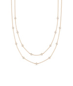 Rose gold Layered Diamond Bezel Station featuring dimensional sparkle