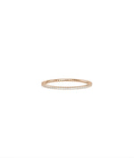 Diamond Eternity Band Ring stacked with other bands showing versatile layering appeal