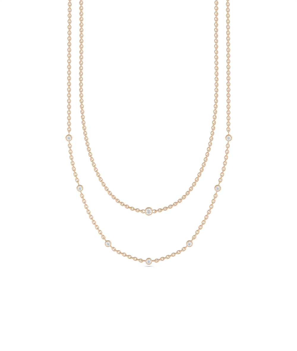 Rose gold Layered Diamond Bezel Station featuring dimensional sparkle