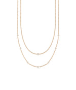 Rose gold Layered Diamond Bezel Station featuring dimensional sparkle