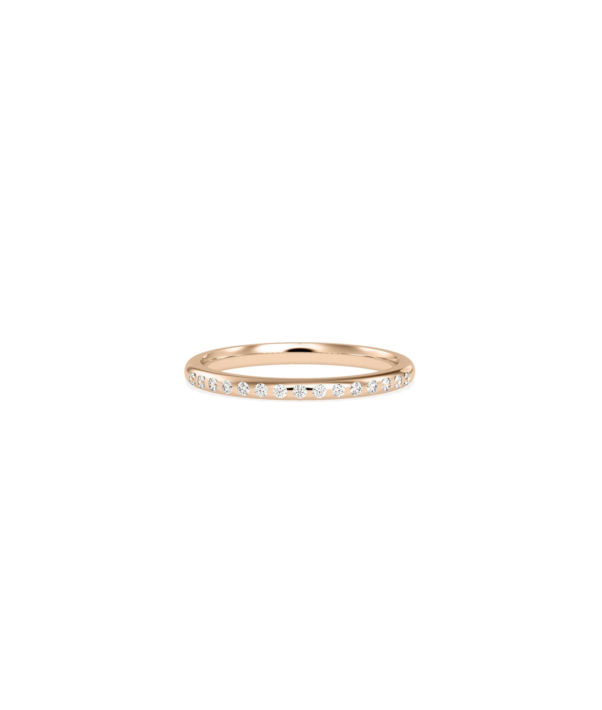 Diamond Bezel Band Ring stacked with other bands showing seamless modern layering