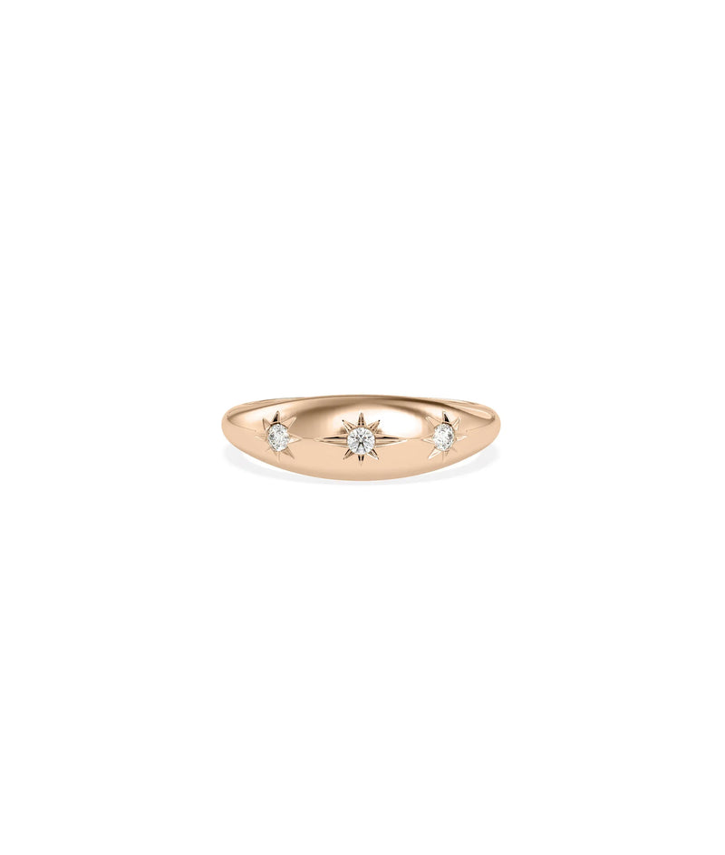 Rose gold dome ring featuring dazzling star burst diamond pattern design
