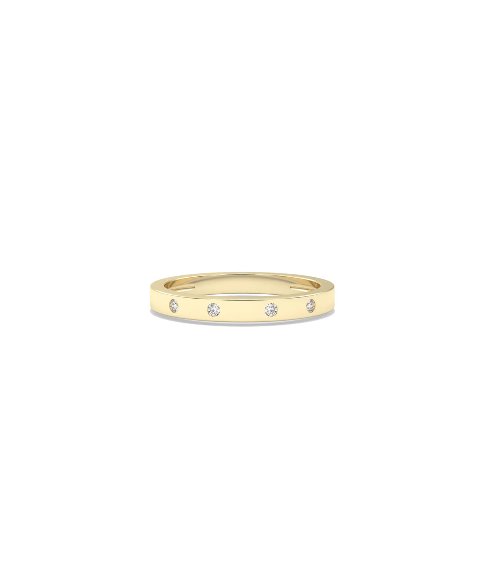 Diamond Bezel Station Band Ring in yellow gold with bezel-set diamond stations