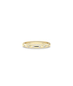 Diamond Bezel Station Band Ring in yellow gold with bezel-set diamond stations