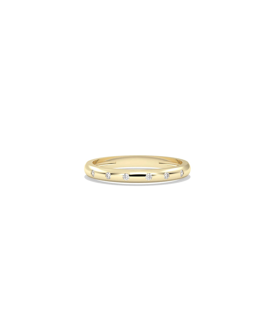 Diamond Bezel Station Band Ring in yellow gold with bezel-set diamond stations