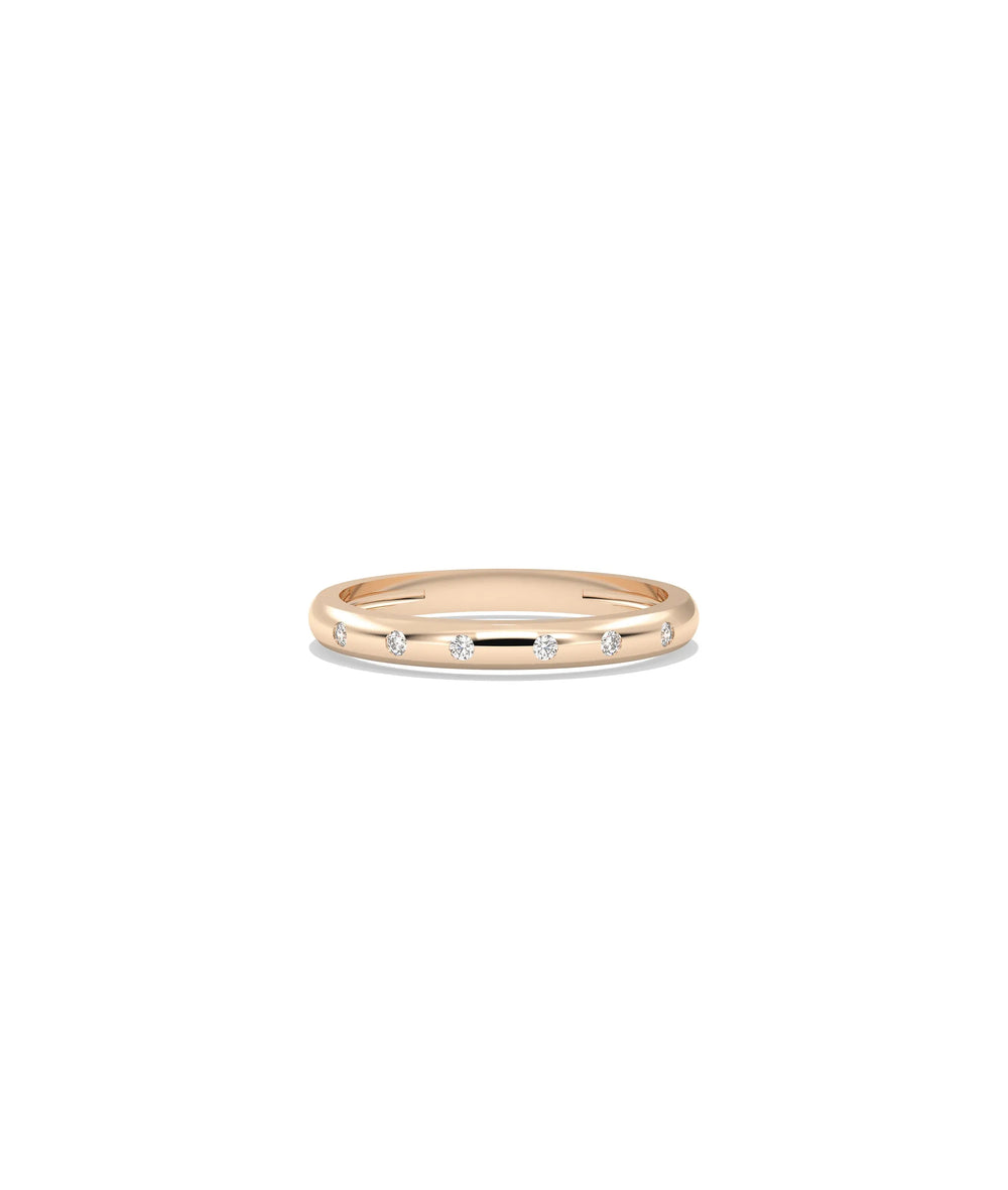 Rose gold Diamond Bezel Station Band Ring with modern bezel stations and sparkle