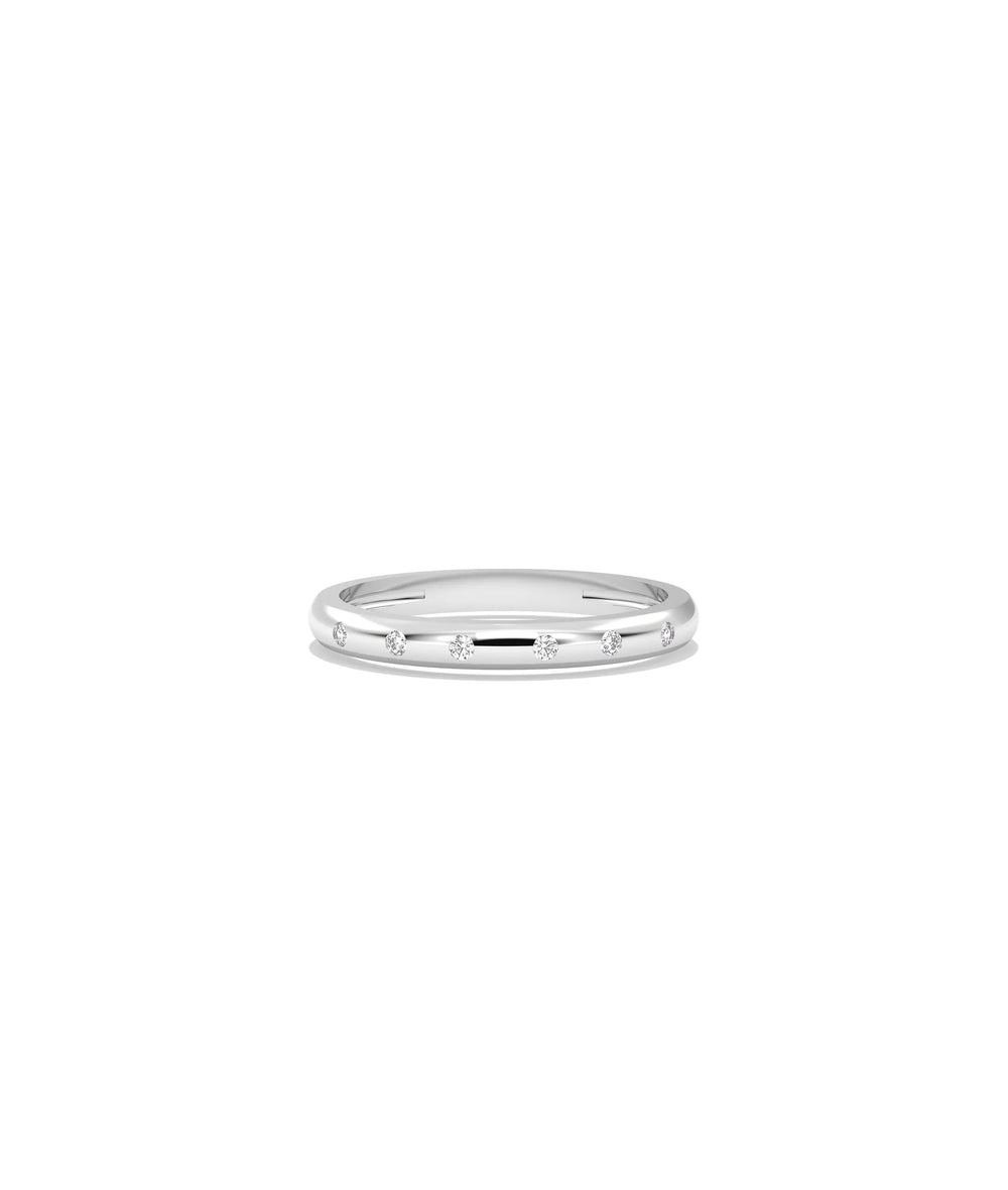 White gold Diamond Bezel Station Band Ring featuring sleek bezel-set station pattern