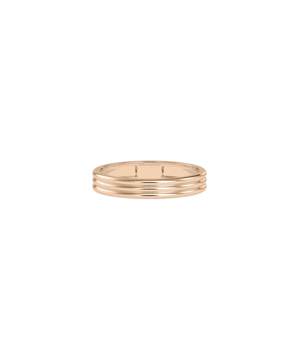 Rose gold Fluted Band Ring with elegant vertical grooves and timeless texture
