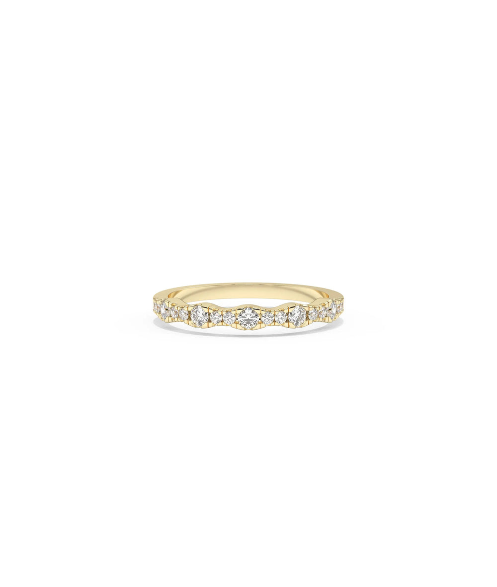 Diamond Graduating Band Ring in yellow gold with progressive diamond size increase