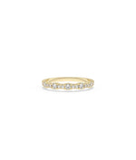 Diamond Graduating Band Ring in yellow gold with progressive diamond size increase
