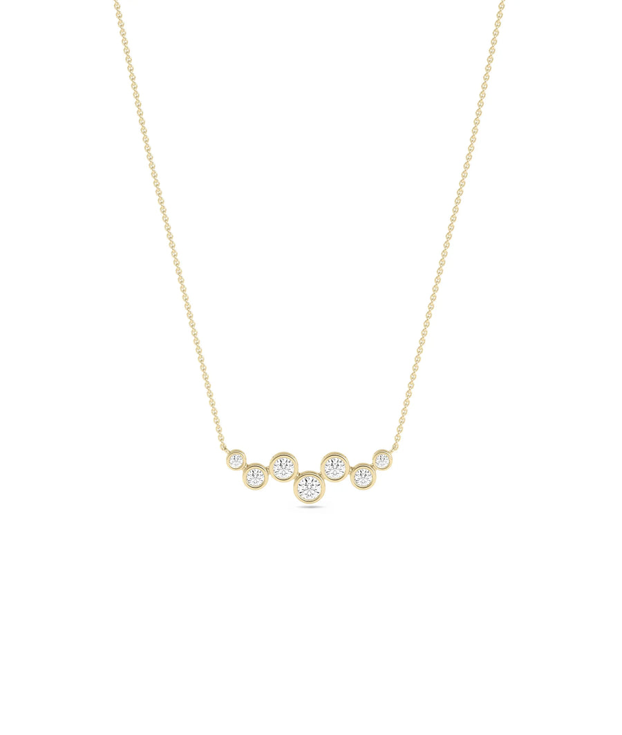 Diamond Bezel Set Cluster Necklace in yellow gold modern grouped