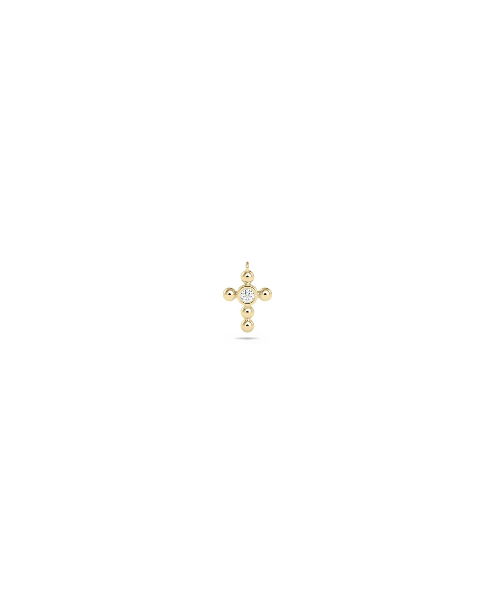 Diamond Solitaire Cross Charm in yellow gold delicate faith