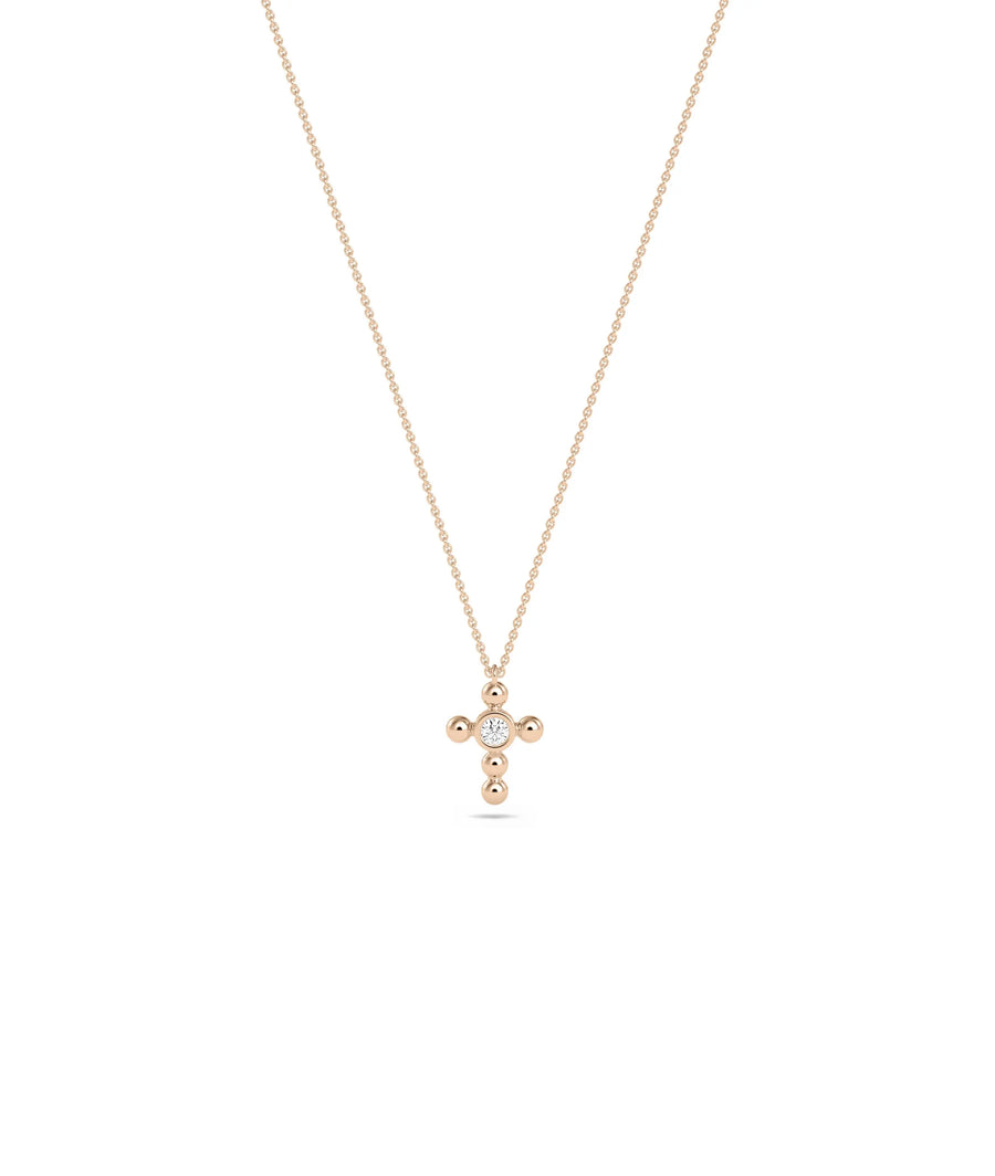 Diamond Solitaire Cross Charm in rose gold warm faithful elegance