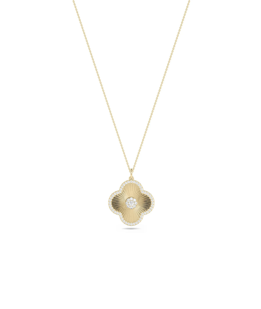 Close-up showing 15mm four-leaf clover with 0.25 Cttw diamond center