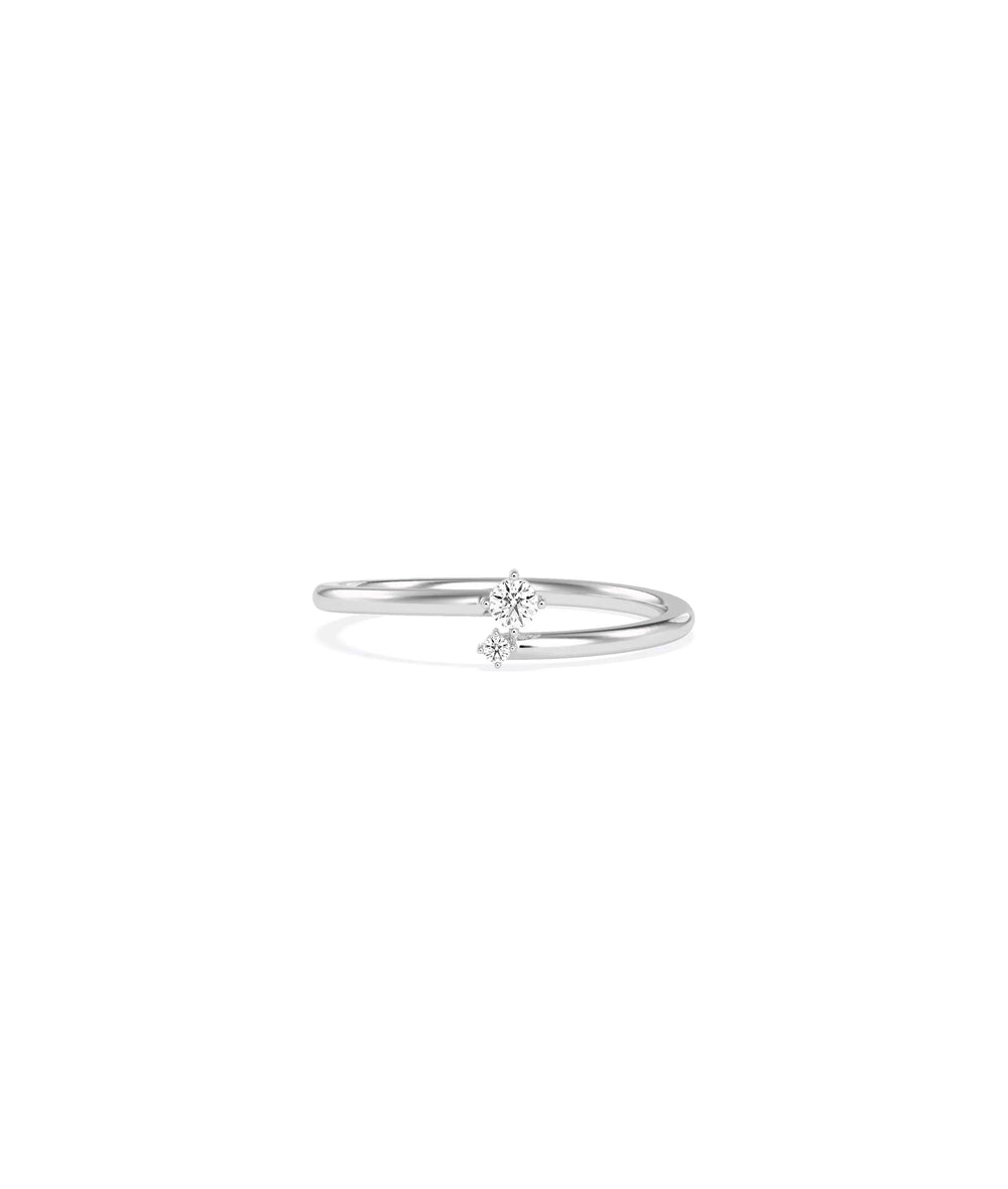 Diamond Small and Big Bypass Ring in white gold featuring contrasting diamond proportions
