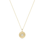 Detail shot of architectural fluted texture on 10mm coin pendant