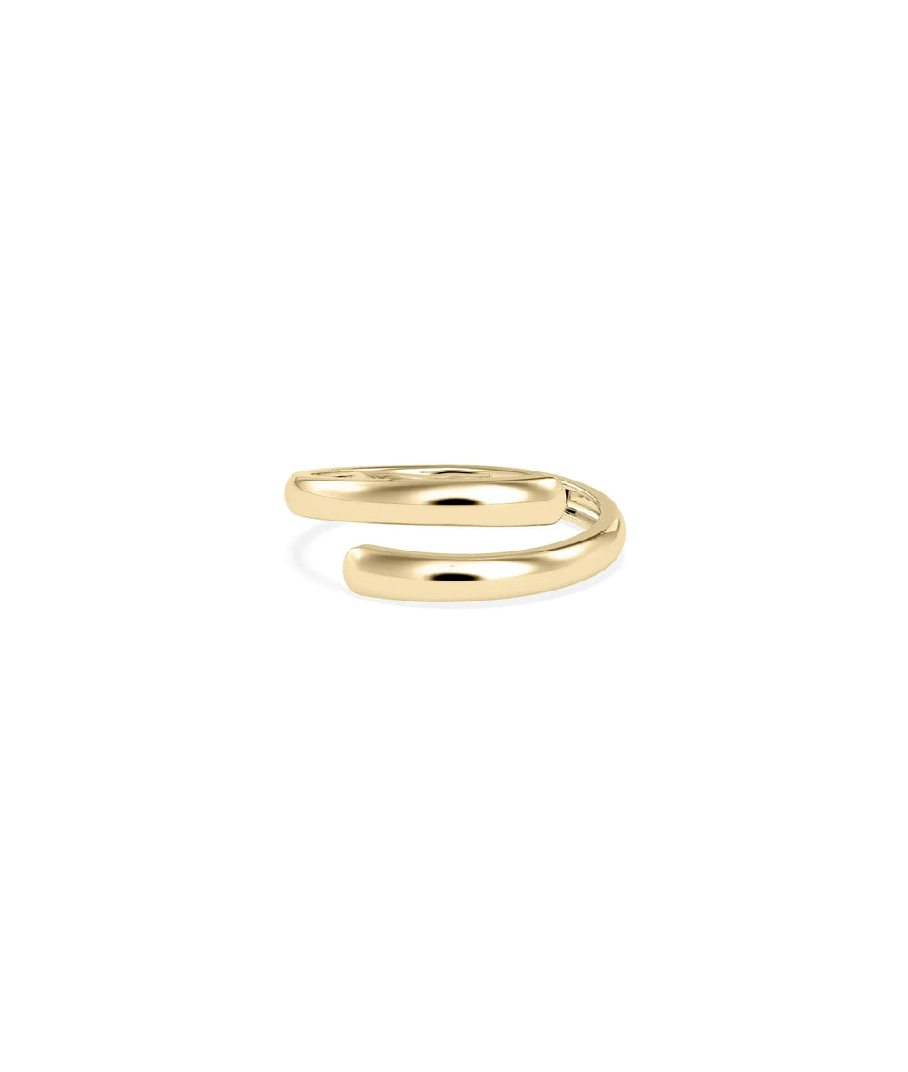 Gold Bypass Ring yellow gold showcasing elegant open-ended flowing design