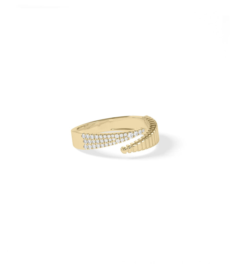 Pave diamonds and fluted texture detail bypass ring close-up