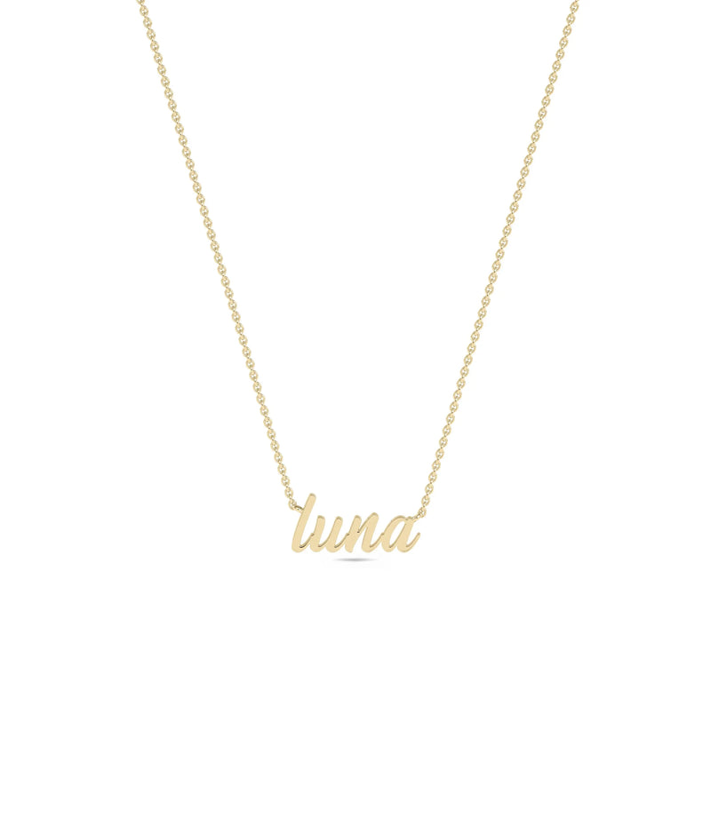 Closeup of Custom Gold Name Necklace script lettering showcasing craftsmanship detail