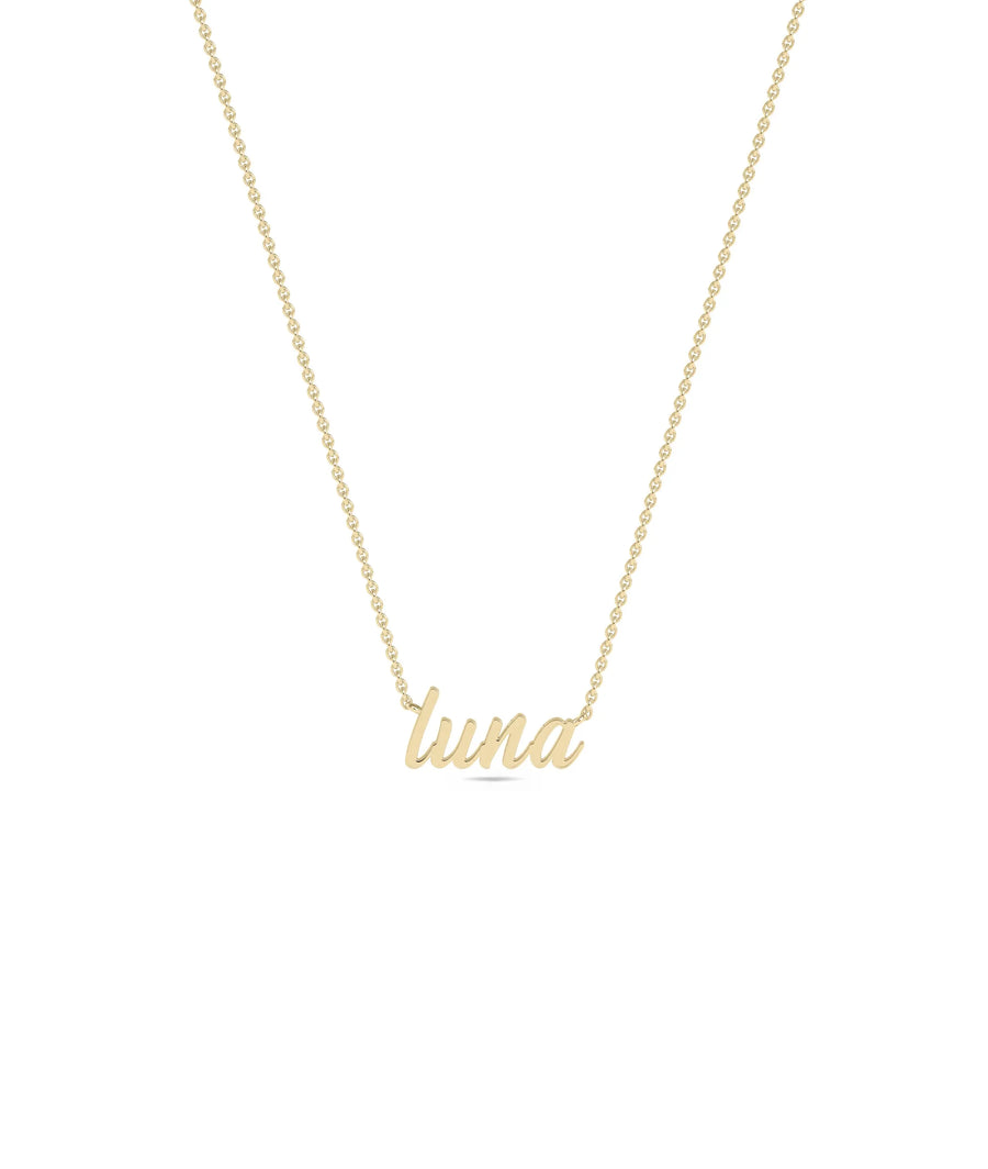 Closeup of Custom Gold Name Necklace script lettering showcasing craftsmanship detail
