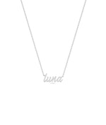 Custom White Gold Name Necklace worn on neckline highlighting personalized nameplate styling
